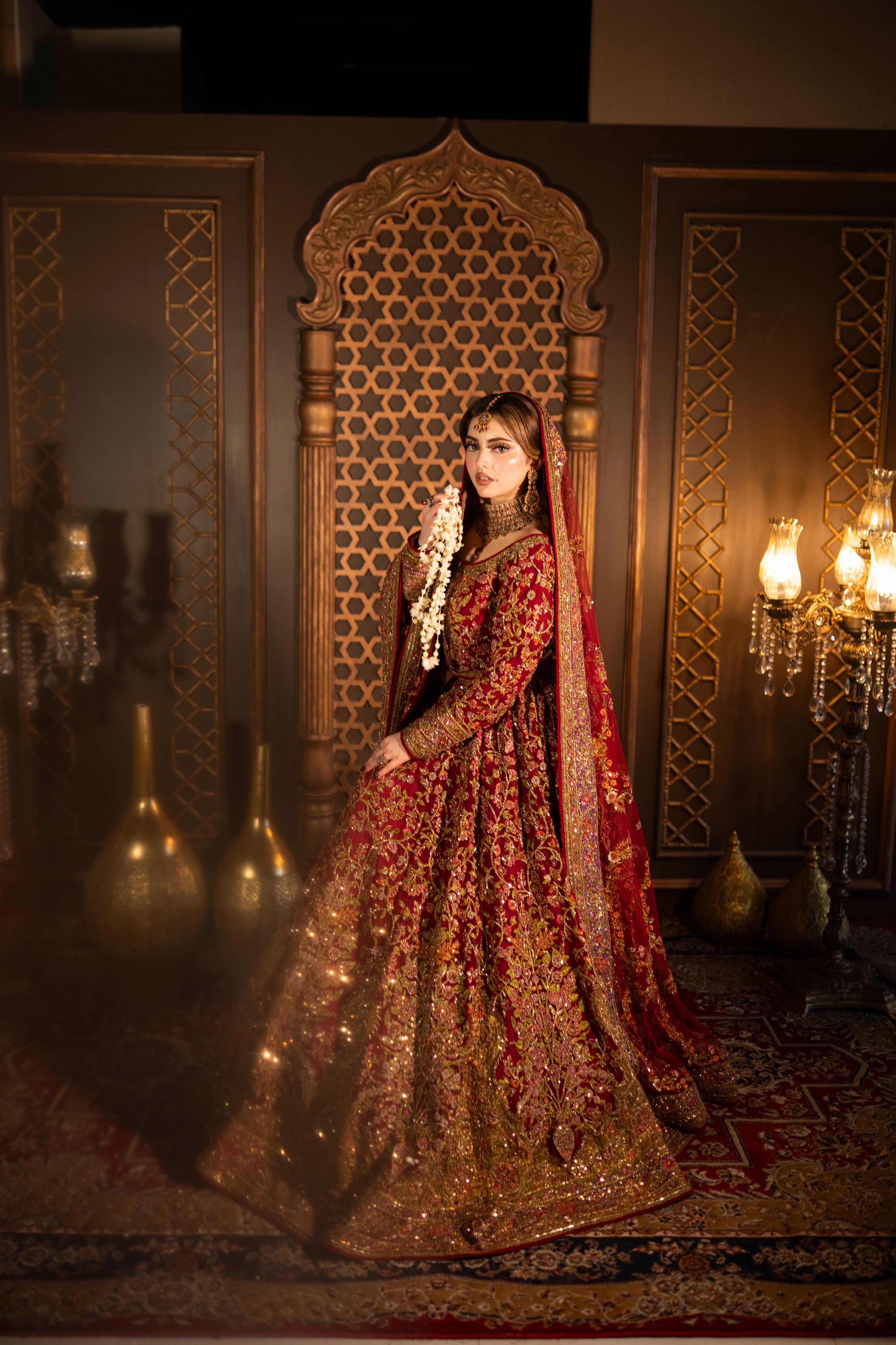 FAHAD HUSSAYN RED LEHENGA CHOLI